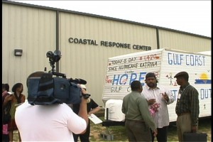 Derrick Evans and Bishop James Black with the KatrinaRitaVille Express in Coden, Alabama.